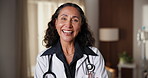 Face, doctor and woman in hospital with smile, knowledge and experience for healthcare management. Happy, mature person and manager in clinic with medical expertise, positive attitude and wellness.