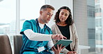 Healthcare, consultation and doctor with tablet in clinic, pointing or explaining report to patient. Hospital, medical professional and discussion with mature person, happy and diagnosis on website