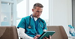 Nurse, man and typing in hospital with tablet, research and AI for healthcare administration report. Person, online and browse in clinic with tech innovation, check medical records or telehealth app.