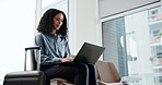 Woman, travel or typing in airport with laptop, check flight status and agenda for work conference. Person, computer and wait in departure terminal for seminar, commute or research for business trip.