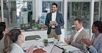 Presentation, applause and businessman with tablet in office for planning revenue growth with goal. Happy, meeting and financial manager with advisors for technology for stock market in workplace.