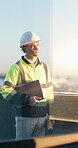 Checklist, man or thinking on rooftop for construction, architectural vision or urban development. Clipboard, architect or window reflection for city surveying, site assessment or building evaluation