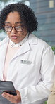Doctor, consulting and person in office with clipboard, test results and medical report for diagnosis. Woman, talking and patient at hospital with checklist, insurance form and healthcare information