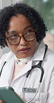 Medical, checkup or woman in clinic with tablet, diagnosis feedback or guidance on treatment option. Healthcare, patient or doctor with tech, care plan or records discussion in hospital consultation.