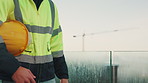 Man, hands and construction worker on balcony with helmet, remodeling project or safety compliance. Builder, person and hard hat outdoor for building site, infrastructure or PPE for injury prevention
