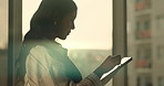 Serious, business and woman in office with tablet, research and online evidence for court case. Profile, person or attorney at law firm with tech, witness statement and legal records for proceedings