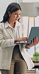 Business, woman and typing in office with laptop, online research and proposal for company funding. Person, browsing and email in workplace with computer, finance report and send investment request.