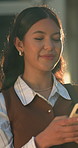 Chatting, conversation or happy woman with phone in city for communication or social media. Female person, traveler or user thinking with smile on smartphone for outdoor network or connection in town