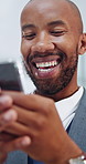 Happy, business and black man with phone in office for social media, network connection or chat. Businessman, employee or smile with smartphone for online texting app, conversation or discussion