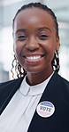 Face, black woman and politics badge for vote, election day and event for equality awareness. Portrait, candidate and smile in office for voting rights, social responsibility and democratic campaign