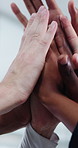 People, hands and meeting with high five in office for business success, winning or teamwork. Group, employees or diversity in unity, or solidarity for company mission, celebration or achievement
