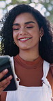 Smile, woman and student in nature with phone, chat and scholarship update for education. Happy, female person or laugh outdoor with mobile app, study schedule and university application for learning
