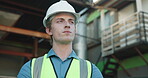 Construction, thinking or man outdoor with ppe, progress review or mindset in building evaluation. Industrial, below or engineer with hardhat, project perspective or operation planning on site.