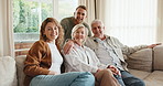 Happy, relax and face of family on sofa in home for bonding, connection or weekend break together. Smile, people and portrait of adult children with senior parents in living room in apartment.