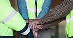 People, team and warehouse with hands together for meeting, supply chain or collaboration. Group, contractor or employees piling with stack in storage depot for shipping, mission or service delivery