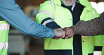 People, team and warehouse with fist bump for meeting, supply chain or unity together. Group, contractor or employees with touch, trust or support in storage depot for shipping, mission or solidarity
