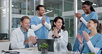 Laptop, people or applause with medical team in hospital, wellness breakthrough or surgery success. Happy doctors, nurses or clap in clinic for healthcare goal, high five or fist pump with computer