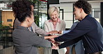 Business, people or applause with hands together in office for company mission, winning or teamwork. Group, employees or colleagues piling with stack, clapping or celebration for success in workplace