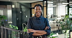 Sustainable, face or black woman in office with arms crossed, esg advisor or pride in eco startup. Happy, portrait or csr expert with confidence, environmental services or about us in green business.