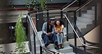 Phone, steps and team talking in office, show project or sustainability report at ESG startup. Mobile, conversation or business people at stairs for eco friendly proposal, share idea or collaboration