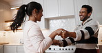 Dancing, happy and couple in kitchen at house listening to music, playlist or radio together. Laugh, love and man with woman for moving to song for bonding, care and connection in home on weekend.