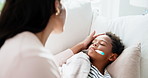 Comfort, mom and kid in house with thermometer, childcare and health monitor with flu symptoms. Support, mother and child in home with tech, parenthood and temperature check in illness assessment.
