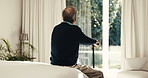 Thinking, bedroom and senior man with walking stick for nostalgia, reflection and remember in home. Retirement, pensioner and person with memory, thoughtful and cane for support, balance and wellness