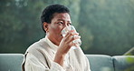 Woman, thinking or drinking with water on sofa for nutrition, health or outdoor wellness in backyard. Senior, female person or contemplating with mineral liquid or glass for vitamins or hydration