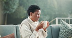 Patio, thinking and woman with coffee in morning for wellness, reflection and start day in house. Break, mature and African person with drink for positive mood, peaceful weekend and relax outdoor
