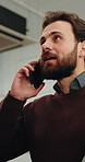 Phone call, talking and man in building for evaluation, construction update and communication. Architecture, low angle and person on cellphone for conversation, contact and feedback for renovation