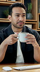 Man, thinking and coffee in office with computer, inspiration and vision for blog story on website. Creative, writer and person typing in workplace with desktop, warm tea and reflection for news.