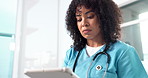 Serious, woman and nurse in office with tablet, research and email referral for surgery results. Thinking, person or ideas in hospital with tech, medical report and telehealth for healthcare services