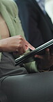 Business, waiting room and hands with tablet, scroll or preparing for interview with research on app. Company, recruitment and person with technology, job opportunity and editing resume on website