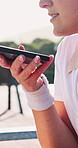 Recording, phone and hands of woman on tennis court for contact, tournament update and fitness. Online game fixture, communication and sports tips with person outdoor for training club and challenge