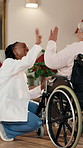 High five, nurse and senior woman in wheelchair for celebration of healthcare or recovery goals. Caregiver, motivation and old person with disability in retirement home for rehabilitation or support