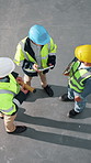 Construction, meeting and above of people on tablet for planning, building update and project. Engineer, warehouse and men with tech, blueprint and talking for renovation, remodeling and architecture