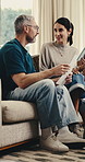Mature, documents and happy couple with tablet for finance, budget planning or investment in home. Man, woman or discussion with invoice or technology on sofa for financial expenses or bills in house