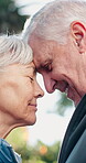 Love, face and old couple with forehead touch, partner trust or outdoor bonding in connection. Happy, bokeh or senior people in park with support, tender moment or romantic relationship in retirement