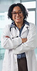 Face, woman or happy doctor with confidence for medical service, career integrity or about us. Portrait, healthcare worker or mature person with smile, arms crossed or experience with flare in clinic