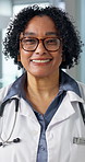 Face, woman and happy doctor in hospital for medical service, career integrity and about us. Portrait, healthcare worker and mature person with smile, confidence and laughing with flare in clinic