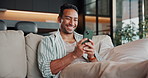 Laugh, weekend and man with phone on sofa for social media, connection and funny conversation. Happy, home and person on cellphone for internet, website and mobile app for chat, meme and online joke