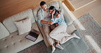 Laptop, hug and people on sofa in house with bonding, connection and affection in marriage together. Couple, computer and woman embracing man in living room for support in relationship from above