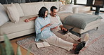 Financial planning, paperwork and happy couple with laptop in lounge, online and investment on web. Asset management, research and people with documents, smile and budget review with tech in house