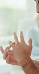 Marriage, conflict or man with wedding ring in home for regret, infidelity or contemplating divorce. Fight, couple and husband with band for broken trust, marital doubt and break up decision on sofa