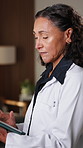 Thinking, doctor and woman with tablet in hospital with research, digital app for test results. Mature person, medical service or professional in clinic with tech, decision and healthcare schedule