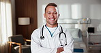 Face, doctor and happy man with confidence in hospital for healthcare advice or medical service. Portrait, male person or smile with pride or arms crossed for health, assistance or help in clinic