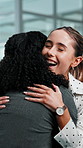 Business, women and hug in office with smile, good news and congratulations for promotion. People, embrace and applause in workplace for teamwork, partnership and celebration for employee recognition