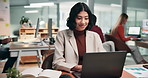 Happy, businesswoman and typing in office with laptop, finance stats or graphs for accounting report. Coworking, person and accountant in firm with computer, charts and smile for financial analysis.