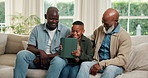 Father, grandfather and child with tablet on sofa in living room of home together for visit. Black Family, tech or social media app with grandparent, dad and son in house for generations or game