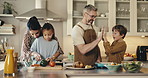 Cooking, happy and family in kitchen at house for bonding, care and learning culinary skills. Smile, connection and children with parents for preparing dinner, meal or supper for development in home.